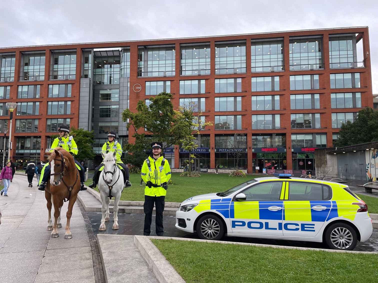 PC Lomas alongside GMP police horses Bumble and Hexam in Piccadilly Gardens-2