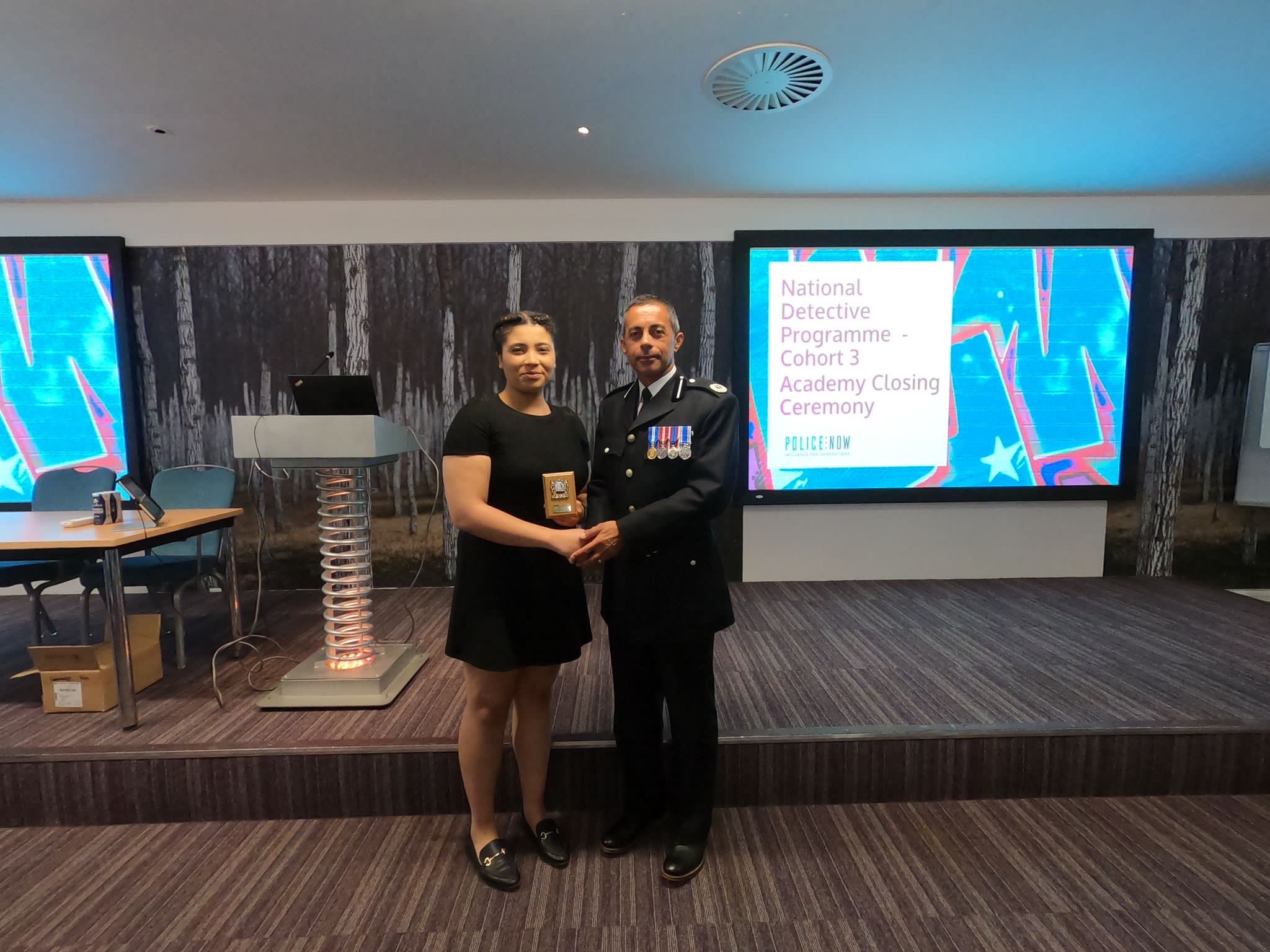 Bedfordshire ACC Sharn Basra and Katie Landsborough receiving her award at the academy closing ceremony