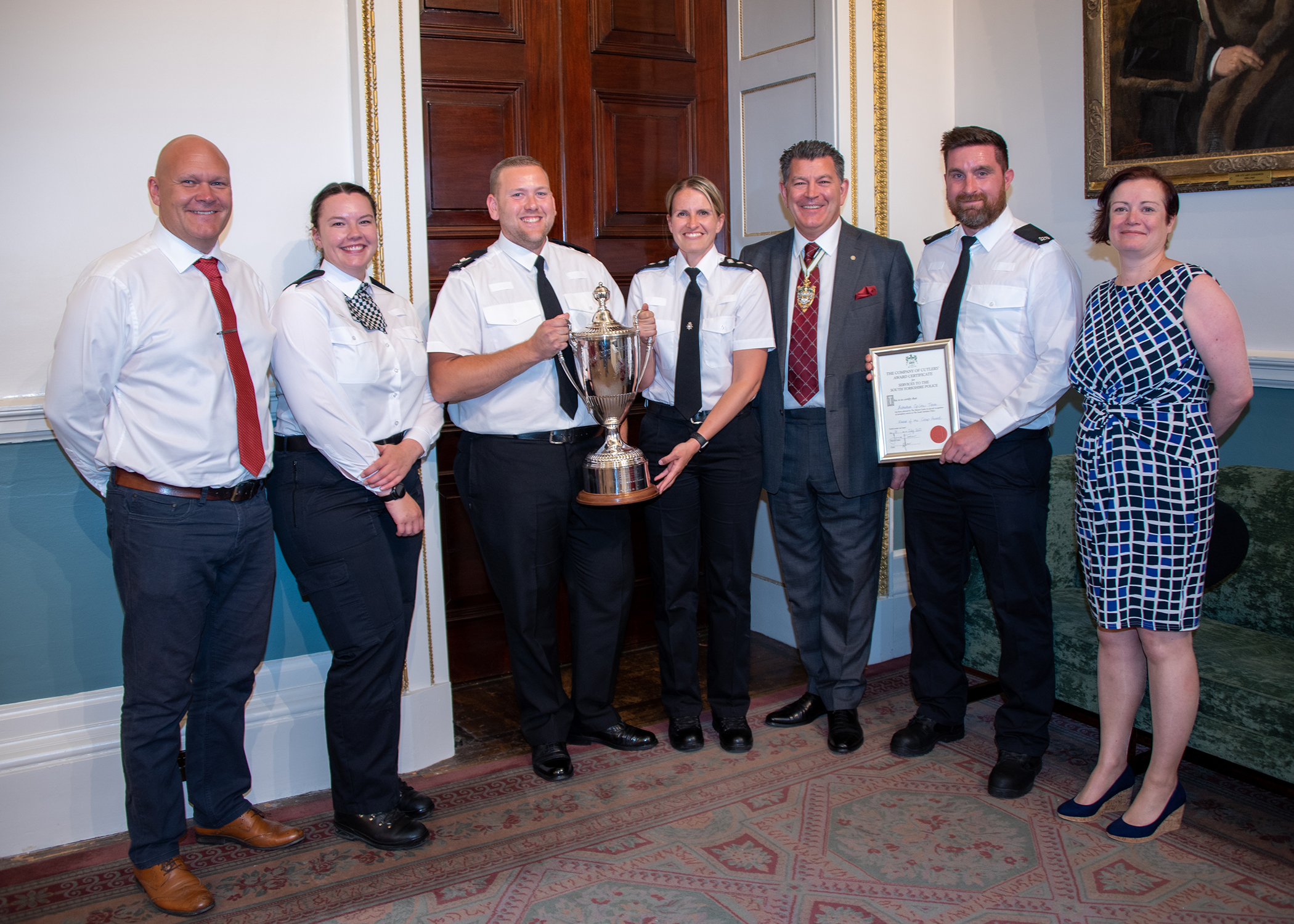 PC Liam Morris (second from the right) and the Rotherham ‘Op Grow’ team receiving the ‘Police Team’ award at the Cutlers’ Company Police and Fire Service Awards. Photo credit: South Yorkshire Police