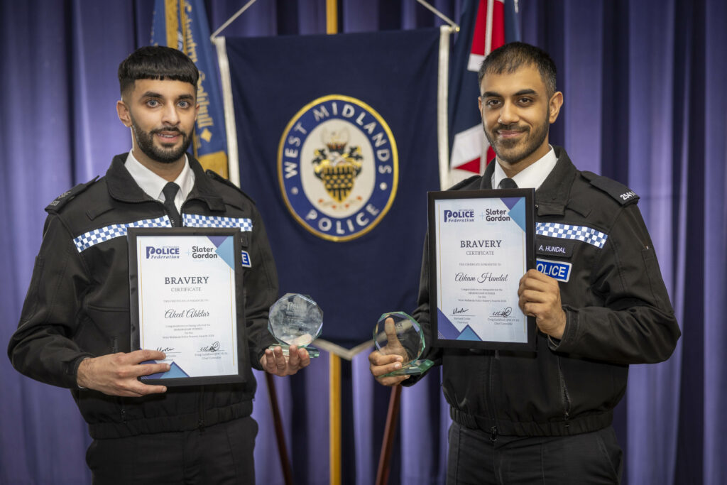 Police Sergeant Akeel Akhtar (left) and Police Constable Aikam Hundal (right) with their awards (Photo credit WMP)